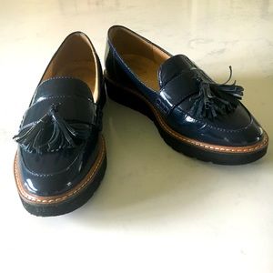 Naturalized navy blue patent leather loafers with tassels. Size 8. Like new